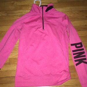A Pink Victoria’s Secret ultimate sweater